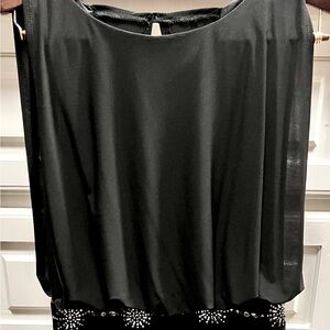 Black dress by Betsy and Adam Looks amazing on. very flattering. Size 12